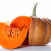 pumpkin on white background with piece cut