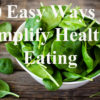 10 Ways Anyone Can Simplify Healthy Eating spinach in the bowl on the dark wood background. toning.