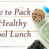 Back to school concept - lunch box with juice, apple and banana, copy space